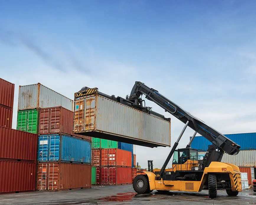 Industrial machine moving cargo container