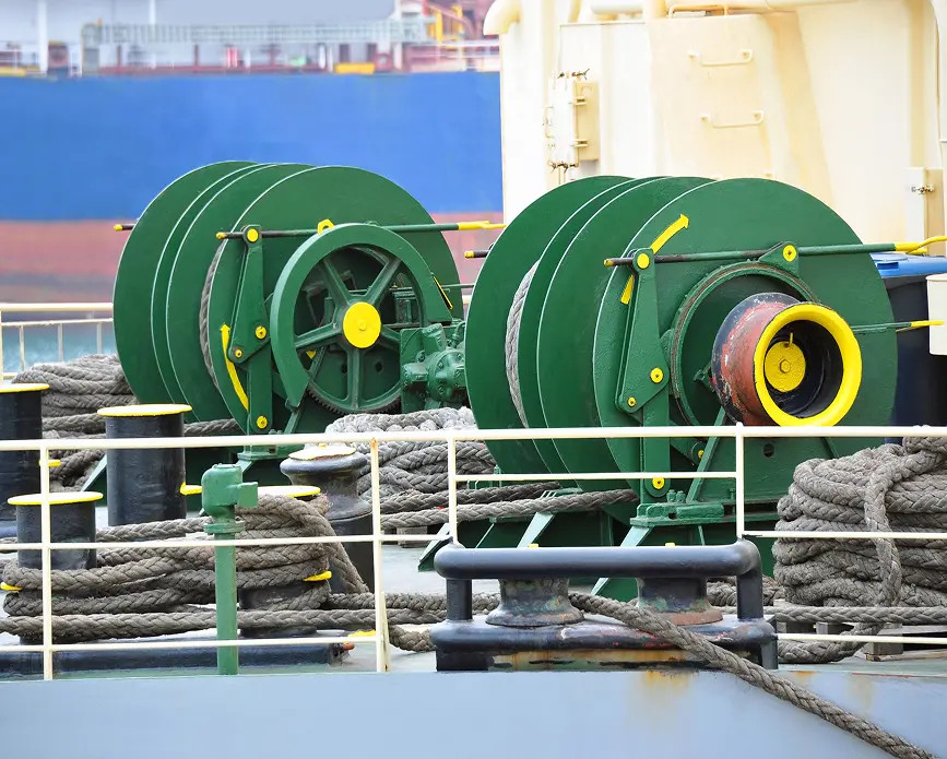 Green ship winches on deck